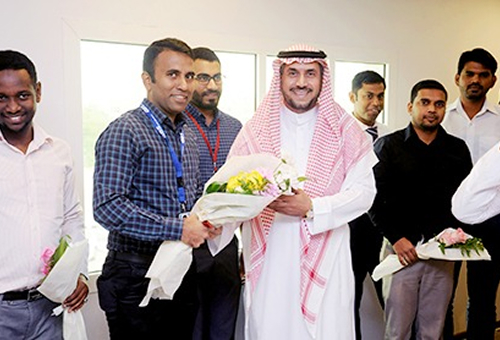 Handing bouquet to important person